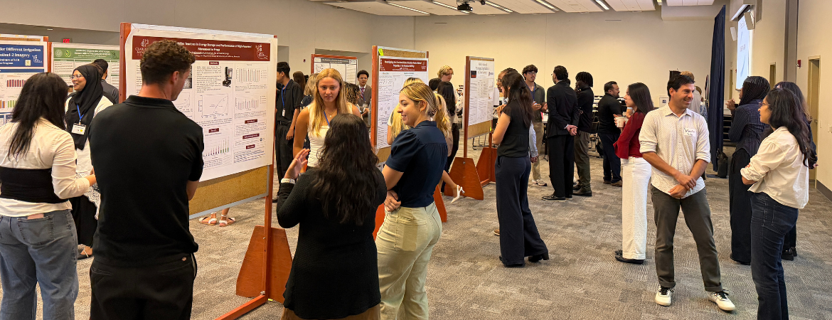 Students and guests at the RISE Symposium Poster Session