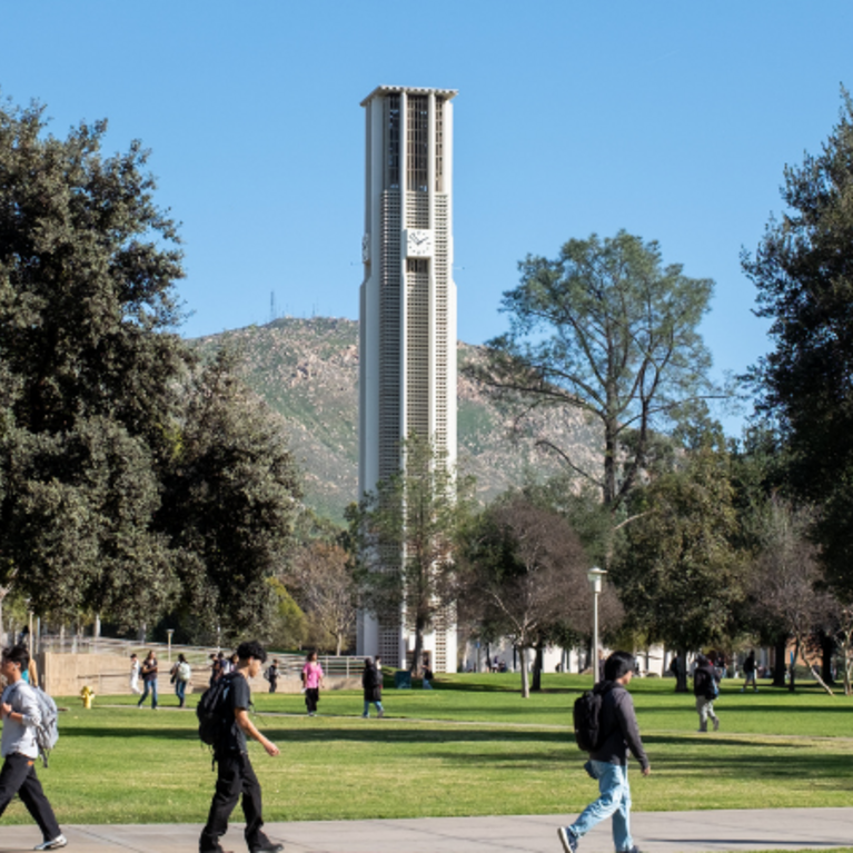 UCR Bell Tower with students walking