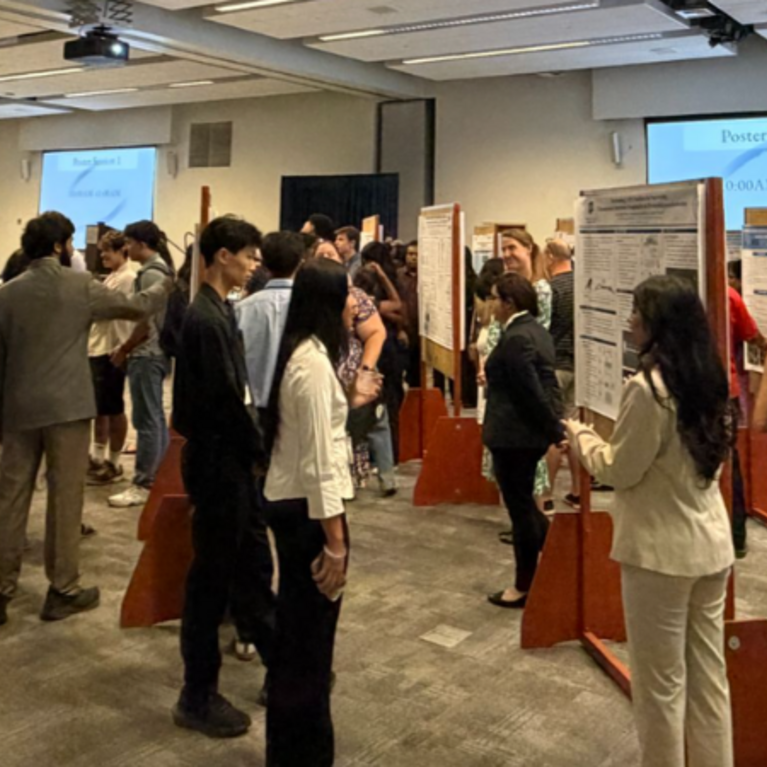 RISE students during the symposium poster presentation session