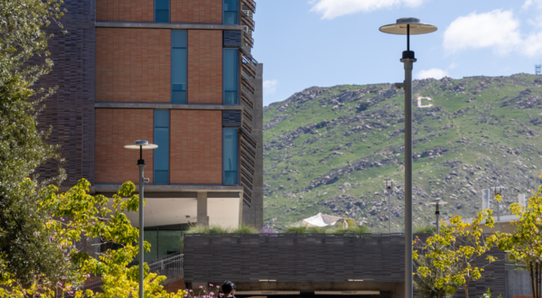 CNAS student walking towards academic building