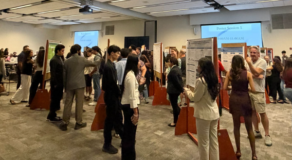 RISE students during the symposium poster presentation session