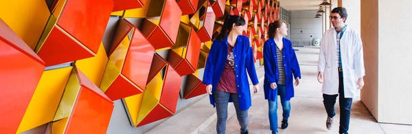 Students walking down the Genomics Walkway