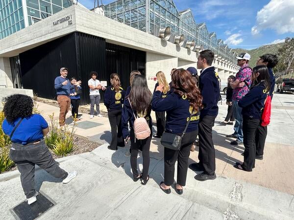 FFA students outside Plant Research 1 with CNAS community members