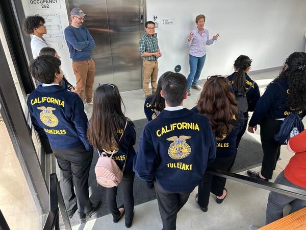 FFA students touring Plant Research 1 with CNAS faculty