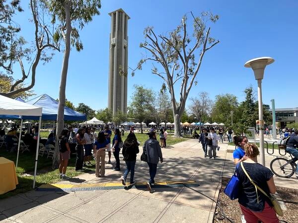 Students walking along Pierce Lawn during Highlander Day