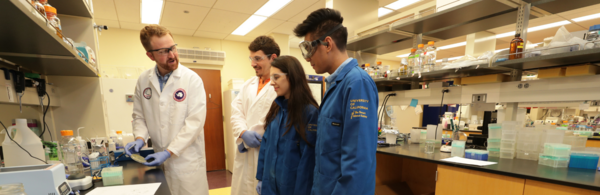 UCR professor Adler Dillman in nematology lab with UCR students