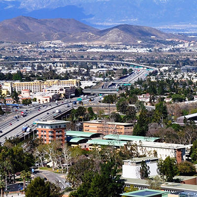 Aerial view of the campus and mountains (c) UCR