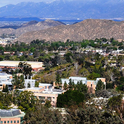 Aerial view of the campus and mountains (c) UCR