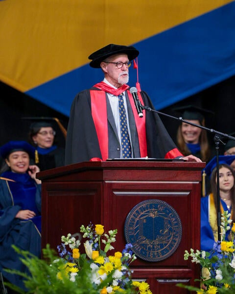 CNAS Dean Peter Atkinson speaking at the 2025 Commencement Ceremony