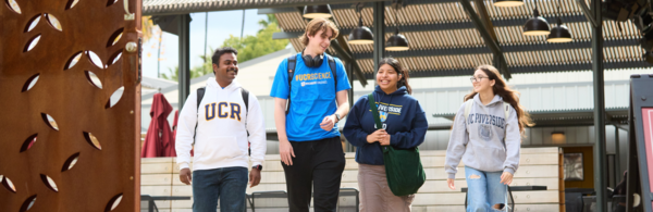 CNAS students walking past The Barn