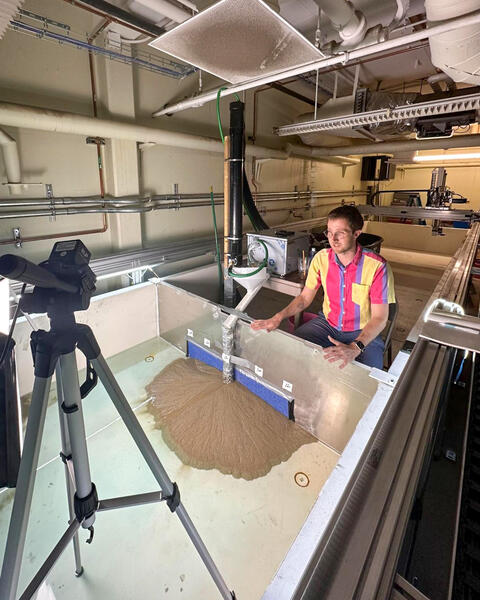 Assistant Professor Eric Barefoot demonstrating the new UCR Experimental Landscapes Facility.