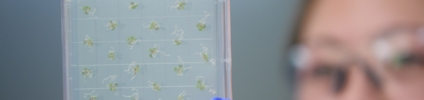 CNAS student holding petri dish