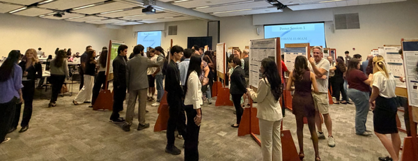 RISE students during the symposium poster presentation session