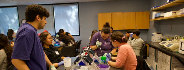 Students conducting lab work in the Sequencing to Success Program
