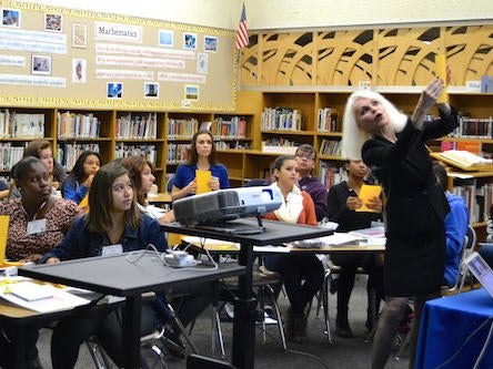 woman teaching female students