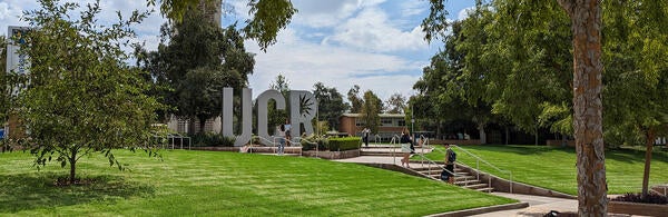 Students at UCR Sign at the HUB Upper Plaza