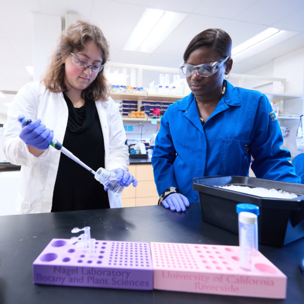 Dawn Nagel and student in lab