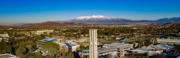 UCR Bell Tower with snow-capped mountains