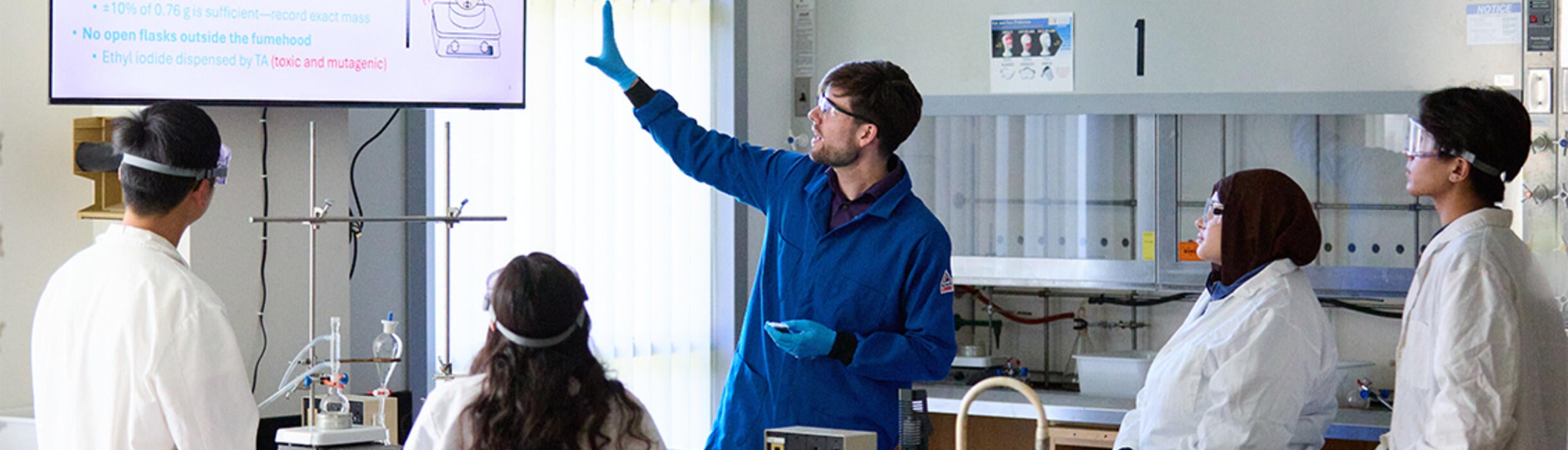 Professor and students in the lab.
