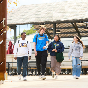 CNAS students walking past the Barn