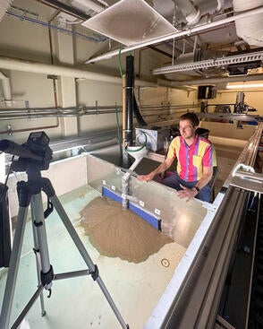 Assistant Professor Eric Barefoot demonstrating the new UCR Experimental Landscapes Facility.