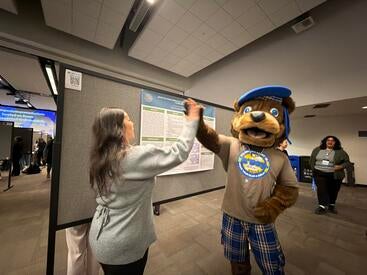Samantha Guli and Scotty at 2026 Undergraduate Research Symposium