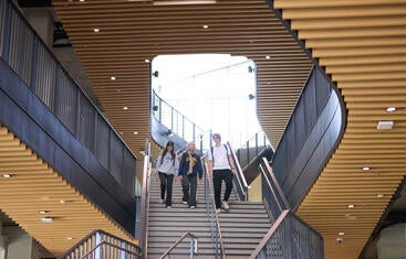 CNAS Students on Student Success Center Staircase
