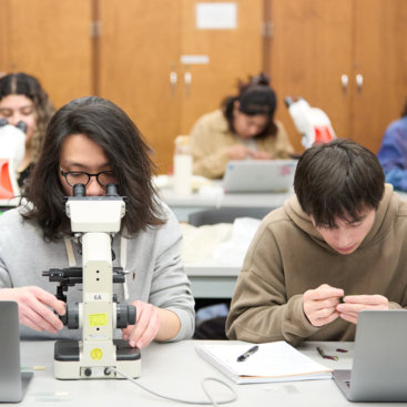 CNAS students using microscopes