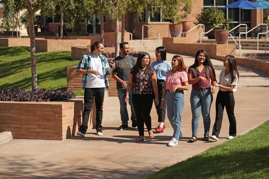 Students Walking Past UCR Highlander Union Building