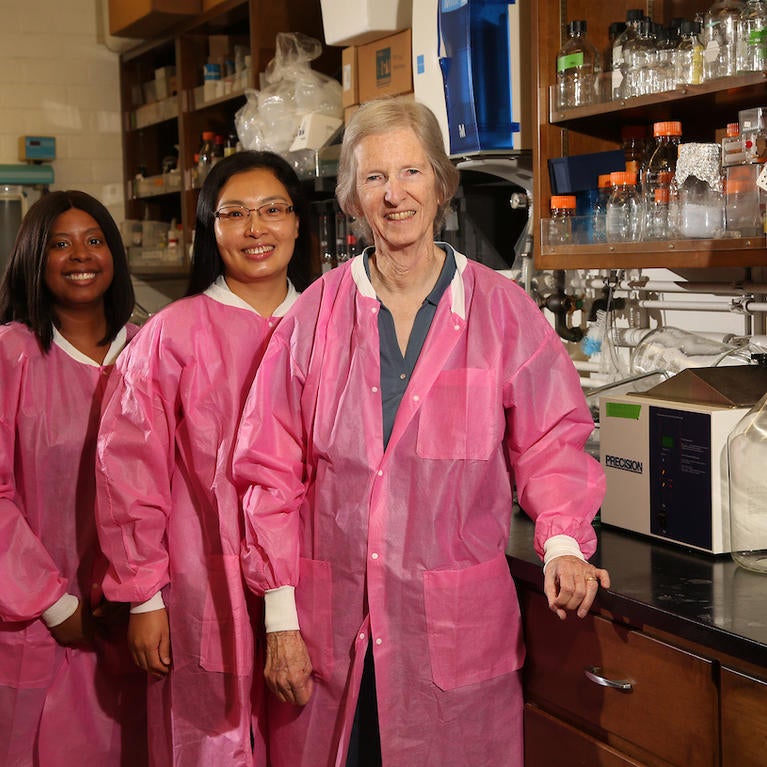 Dr. Prue Talbot in a lab with students