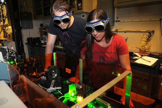 (c) UCR/CNAS - students looking at lasers with goggles on (c) UCR/CNAS - students looking at lasers with goggles on